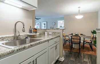Retractable goose neck faucet